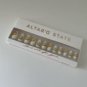 Altard State Smiley Face Nails